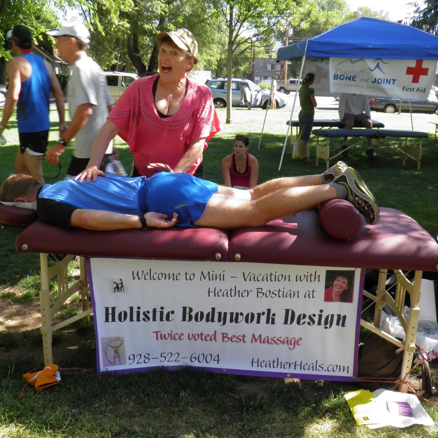 A woman performs holistic bodywork outdoors Flagstaff, AZ
